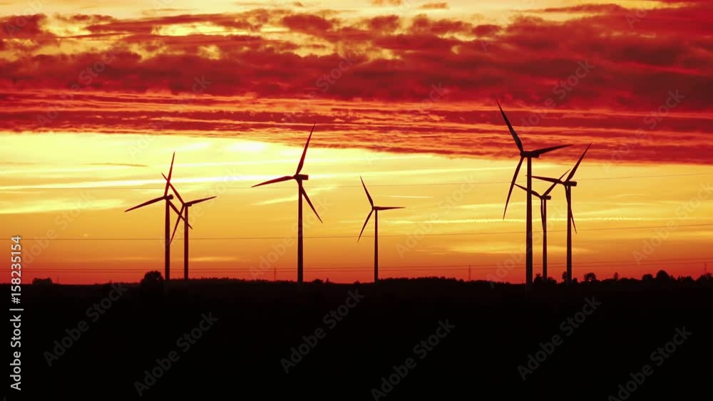High quality video of windmills at the sunset in 4K High quality video of windmills at the sunset in 4K