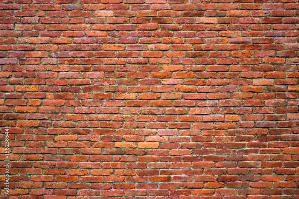 Fototapeta premium red brick wall texture of the stone blocks