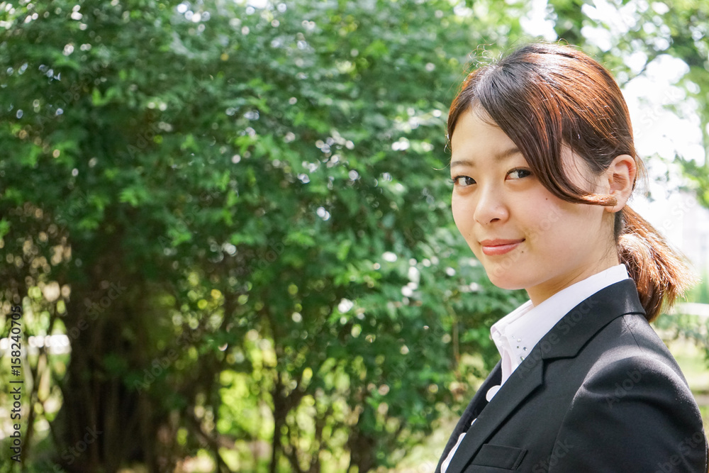 Young business woman working with a smile
