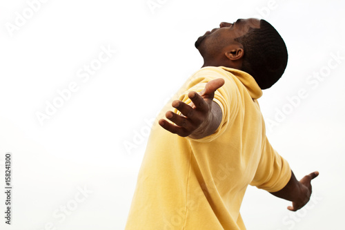 фотографія African American man with open arms.