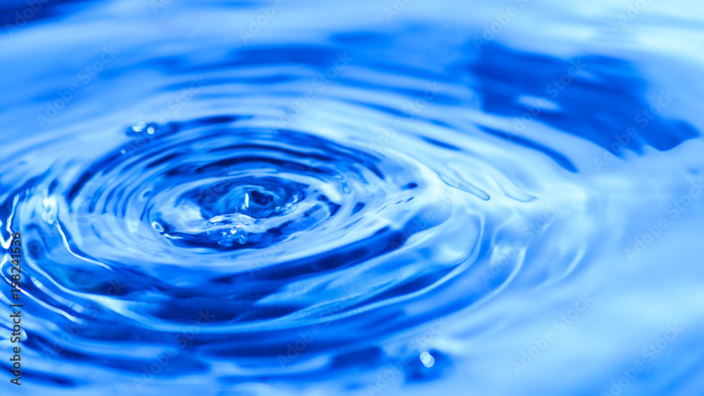 beautyful water drip in blue background