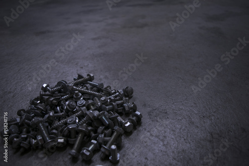 Spilled Bolts On Concrete Floor