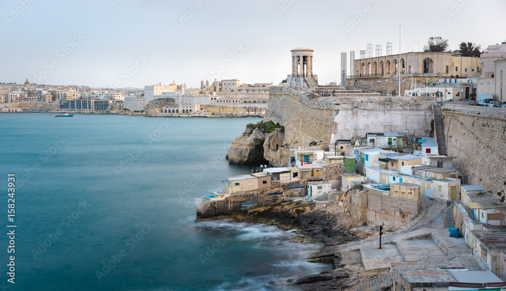 The Grand Harbour view with Valletta seafront, Siege Bell memorial and Lower Barrakka Gardens, Valletta, Malta