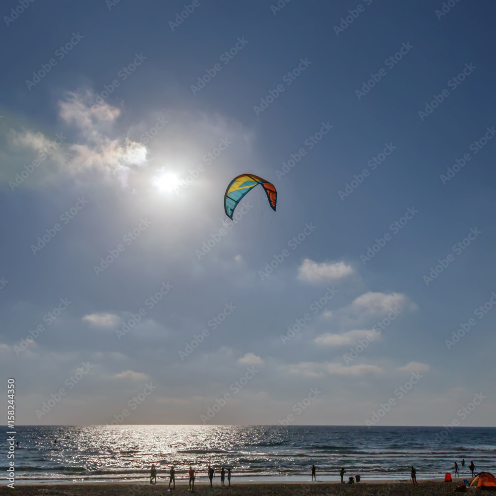 Kitesurfing - Parachute on sky background sunset cloud Kitesurfing - Parachute on sky background sunset cloud