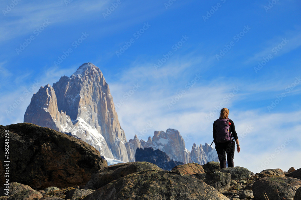Woman hiking in the mountains, Mount Fitz Roy, El Chalten, Patagonia, Argentina