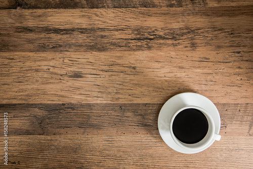 coffee on a wooden board table background