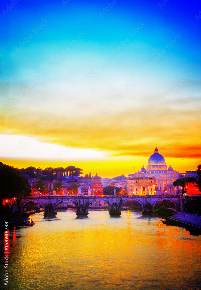St. Peter's cathedral over bridge and river in Rome at orange sunset, Italy, retro toned