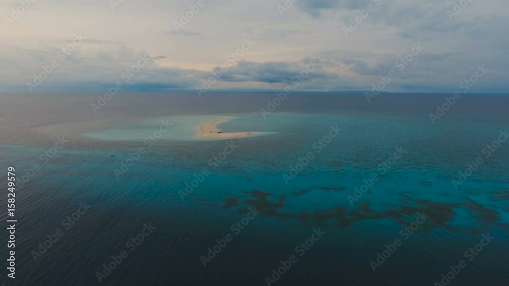 Aerial view of beautiful sand tropical island with white sand beach. White sand island. Beautiful sky, sea , resort. Seascape: ocean and beautiful beach paradise. Philippines, Camiguin. 4K video Aerial view of beautiful sand tropical island with white sand beach. White sand island. Beautiful sky, sea , resort. Seascape: ocean and beautiful beach paradise. Philippines, Camiguin. 4K video