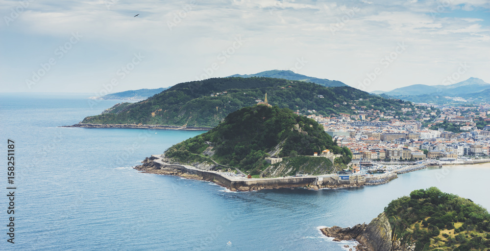 Observation deck in trip holiday in Bilbao, top view on seascape on mountain and island in ocean, background panoramic view of the city landscape. Mock up for text, nature travel concept,