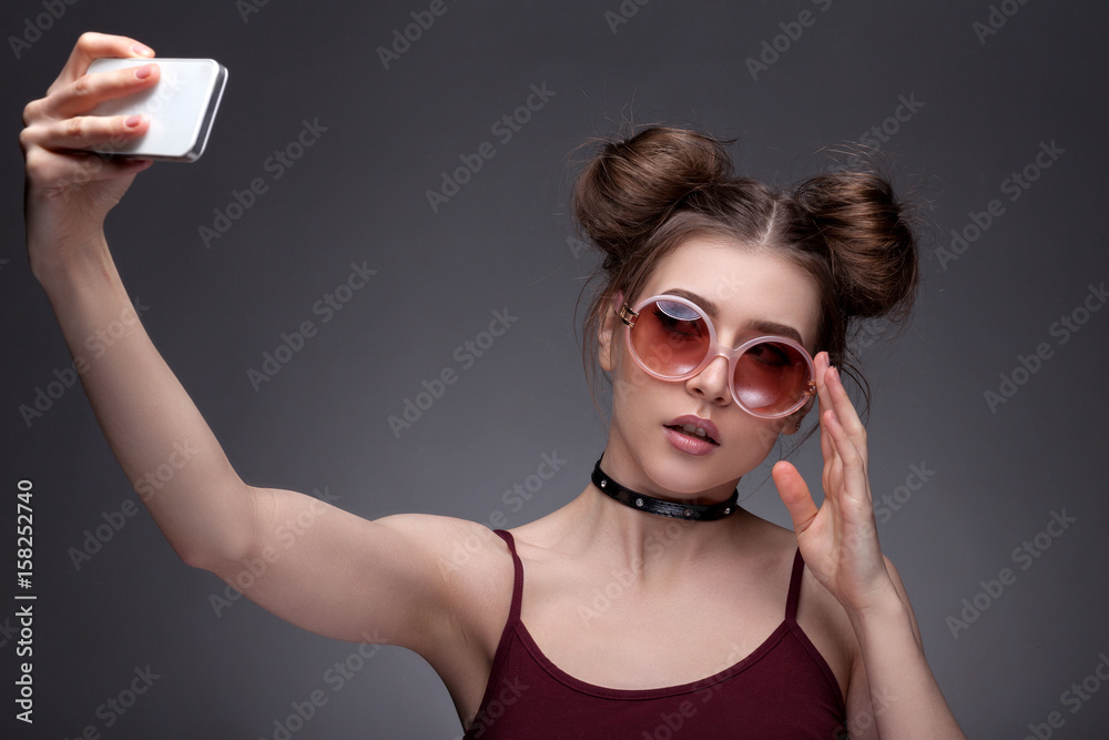 Portrait of a girl doing selfie