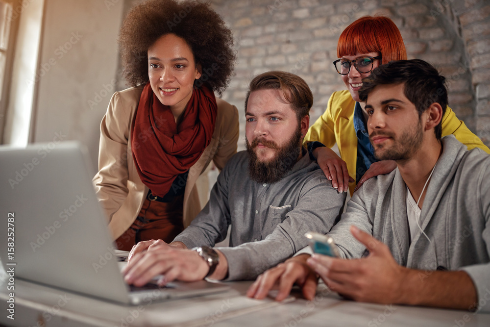 Fototapeta premium teamwork -young web designers working.