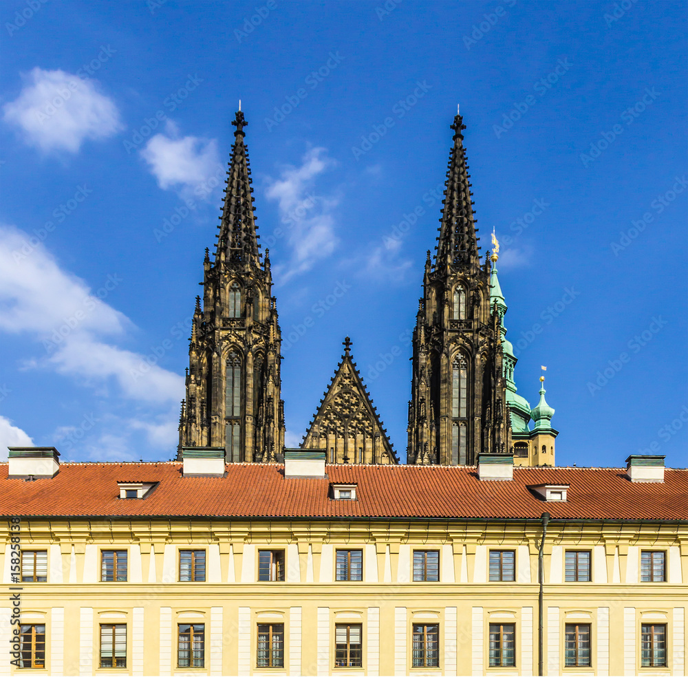View to the St. Vitus church from the side first courtyard of Prague Castle . Area of the Old Town. Prague, Czech Republic. View to the St. Vitus church from the side first courtyard of Prague Castle . Area of the Old Town. Prague, Czech Republic.