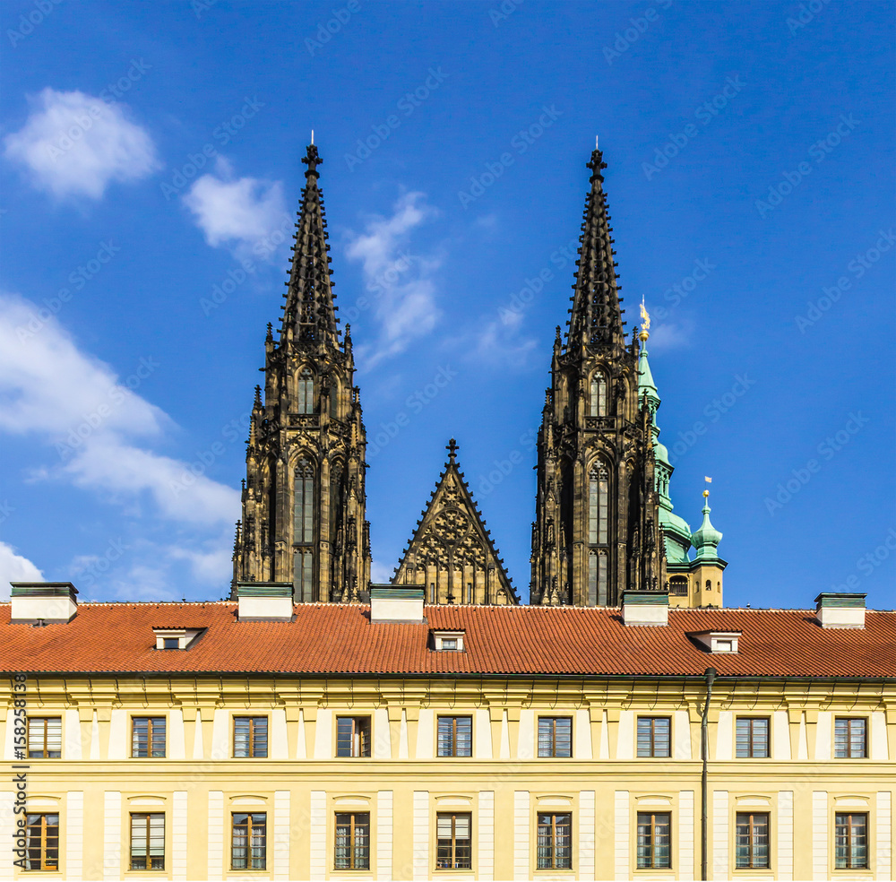 View to the St. Vitus church from the side first courtyard of Prague Castle . Area of the Old Town. Prague, Czech Republic.