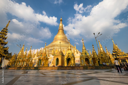 shwedagon pagoda with blue sky yangon, myanmar