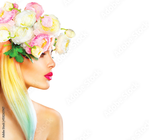 Beauty summer model girl with blooming flowers hairstyle isolated on white
