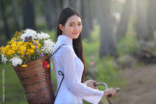 Asian woman dressed in traditional Vietnamese