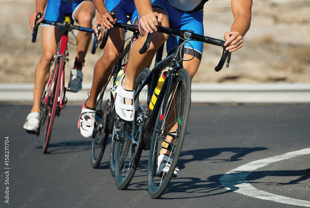 Fototapeta premium Cycling competition,cyclist athletes riding a race at high speed
