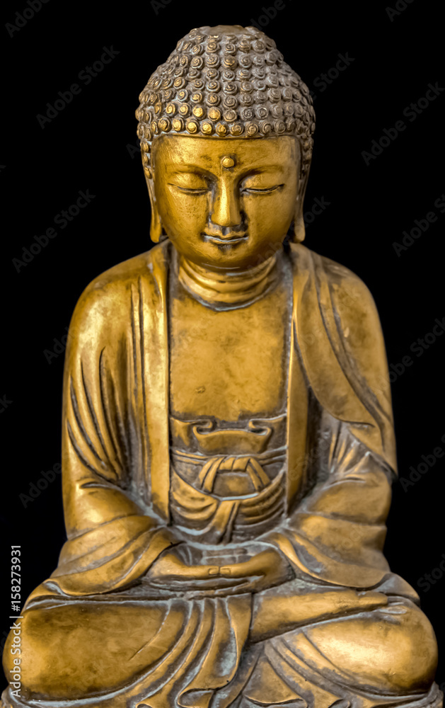 statuette de bouddha sur fond noir 