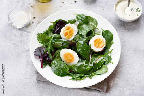 Diet salad with greens and eggs