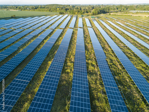 An aerial view of a solar farm set in the english countryside