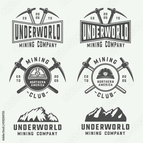 Set of retro mining or construction logos  badges  emblems and labels in vintage style. Monochrome Graphic Art. Vector Illustration.