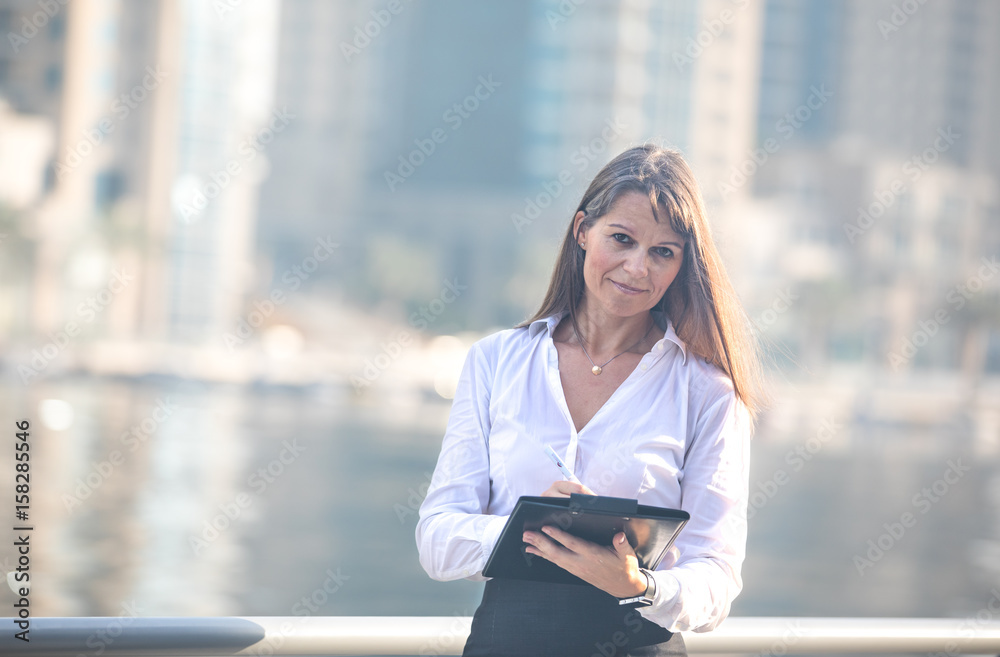 Business woman taking notes. Business woman taking notes.