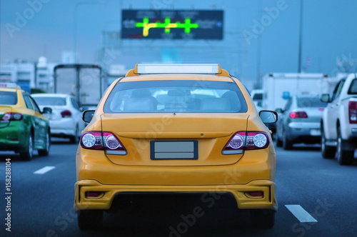 Yellow mustard taxi service © Rattana