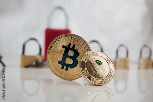 Gold bitcoin and peercoin photo