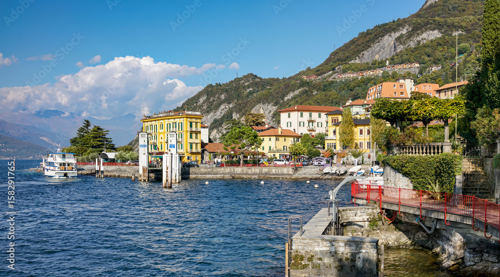 Beautiful promenade along the Lake Como coast in Varena town, Italy.