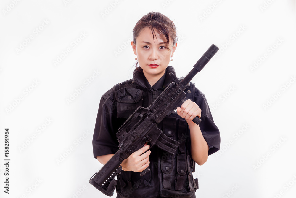 Chinese female police officer with assault rifle Chinese female police officer with assault rifle