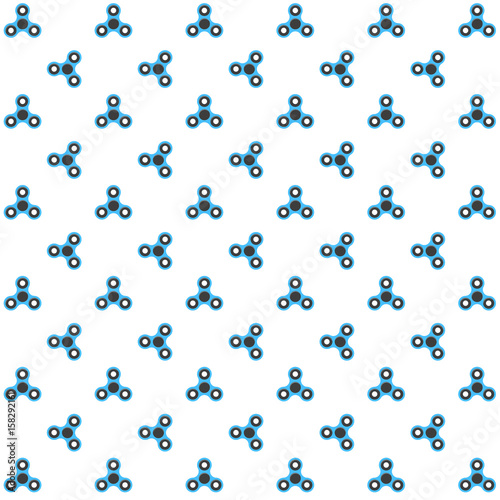 Spinner. A pattern of blue spinners. Spinners spinning on a white background. The object is isolated. Flat style. A modern antistress toy for recreation. Play with your fingers