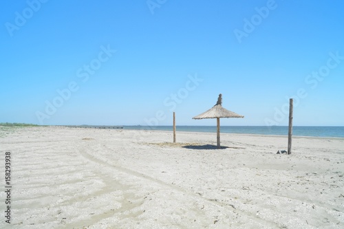 Black sea coast - the deserted beach of Sulina, Romania photo