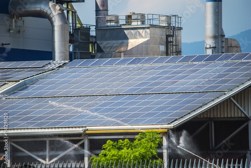 solar panels on top of industrial roof object