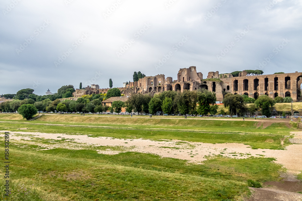 View of Palatine Hill and Imperial Palace from Circus Maximus field (an ancient chariot racing stadium) - Rome, Italy