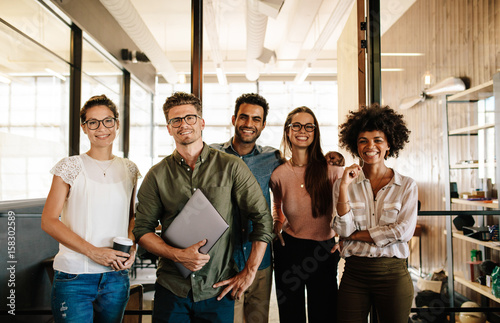 Portrait of successful creative business team