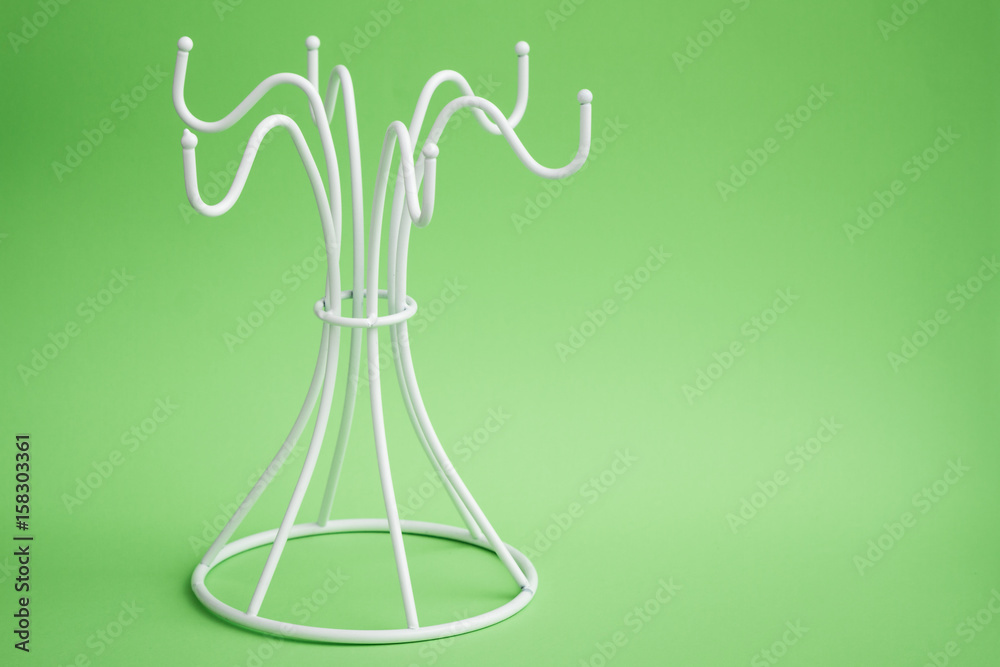 Empty White Coffee Mug Hanger on a White Hanger Empty White Coffee Mug Hanger on a White Hanger