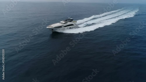 Wallpaper Mural Aerial view of a luxury yacht navigating fast at open sea. Torontodigital.ca