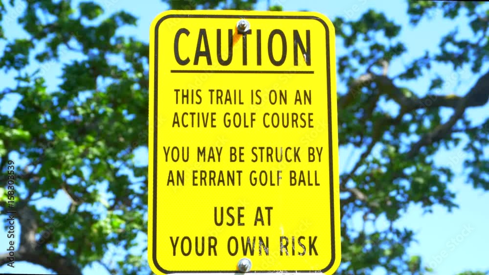 4K Golf Course Caution Sign, Yellow Warning Message 4K Golf Course Caution Sign, Yellow Warning Message