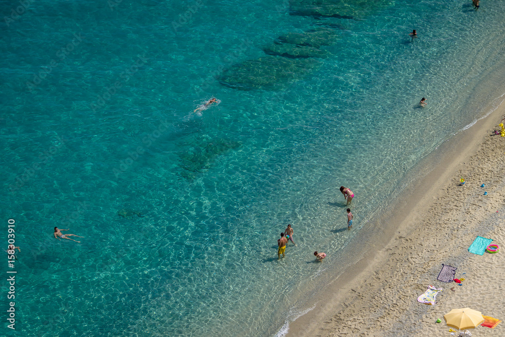 Aerial view of people having fun in Tropea beach - Tropea, Calabria, Italy