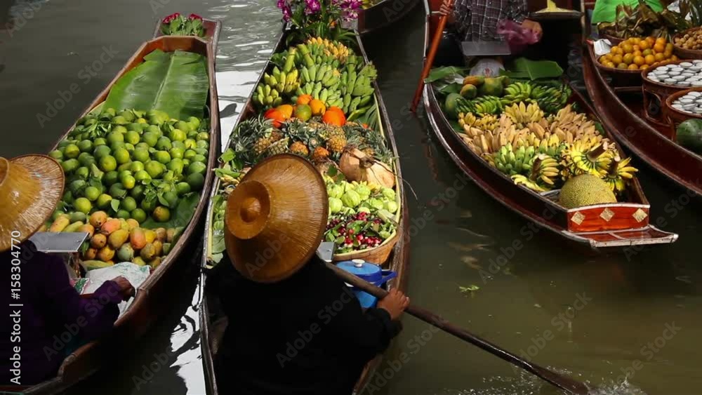 Fruits and vegetables were sold on boat the Damnoen saduak floating market is famous in Thailand