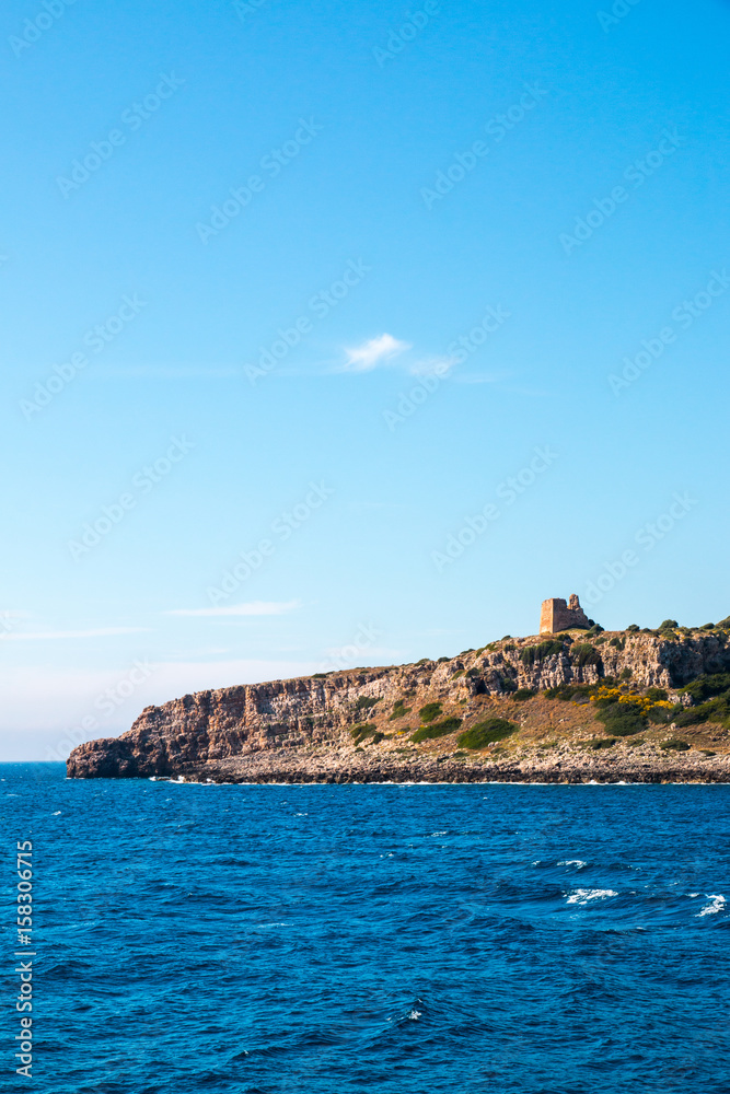 Watchtower near ionian sea (Uluzzo tower in Porto Selvaggio) Apulia, Salento, Italy Watchtower near ionian sea (Uluzzo tower in Porto Selvaggio) Apulia, Salento, Italy