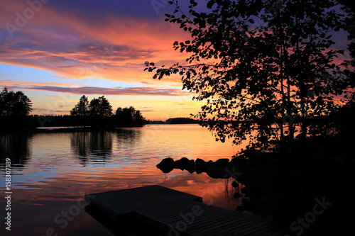Stunning summer evening on Lake Iso-Rasti, Finland © Mark