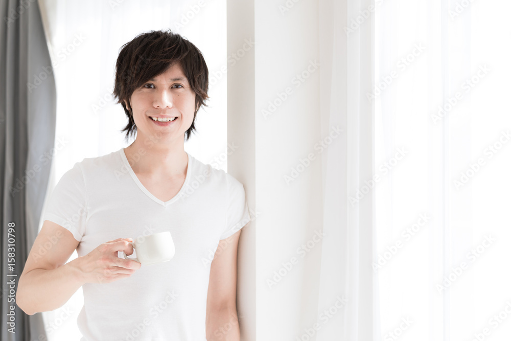 young asian man relaxing young asian man relaxing
