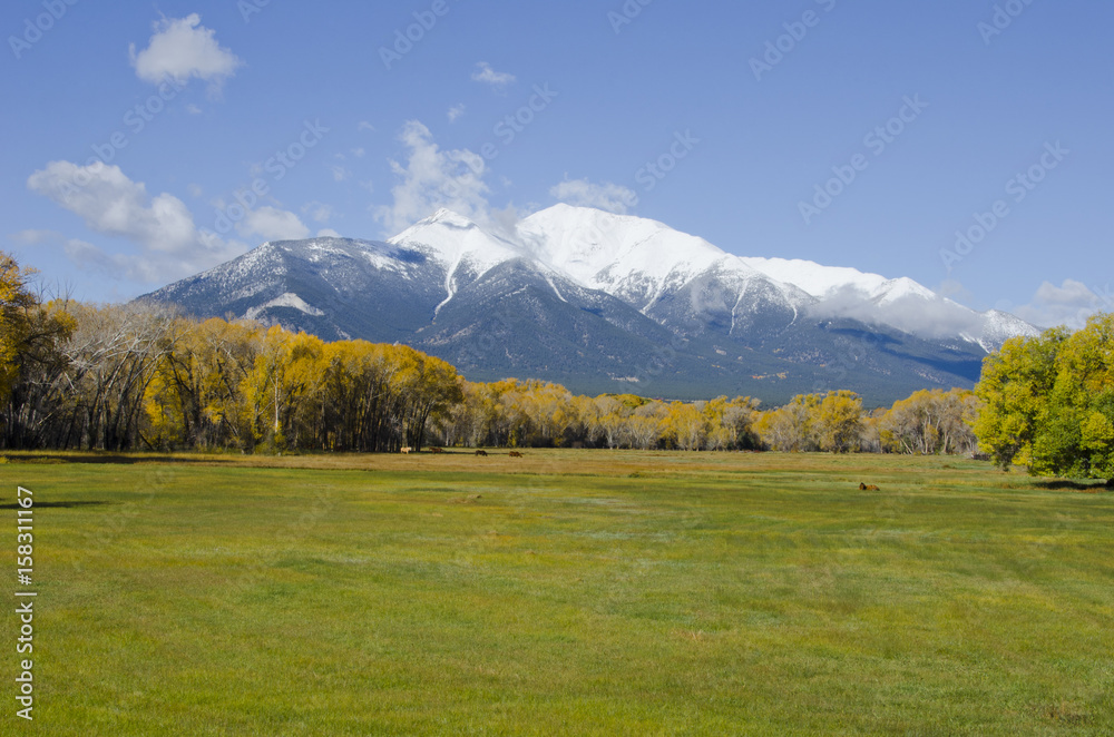 Fresh Snow on a Rocky Mountain Autumn Landscape Fresh Snow on a Rocky Mountain Autumn Landscape