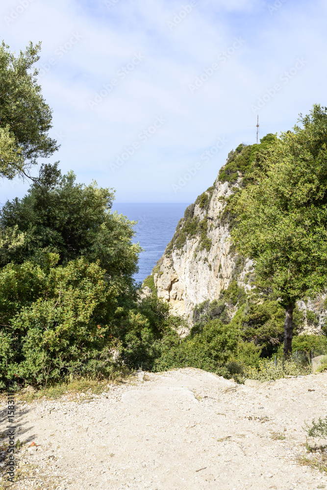View of the Ionian Sea in Paleokastritsa resort. Corfu Island, Greece