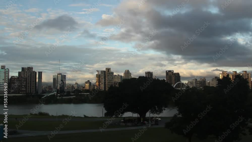 TAIPEI CITY, TAIWAN- DECEMBER 20, 2016- View on Taipei City from the Tamsui River. TAIPEI CITY, TAIWAN- DECEMBER 20, 2016- View on Taipei City from the Tamsui River.