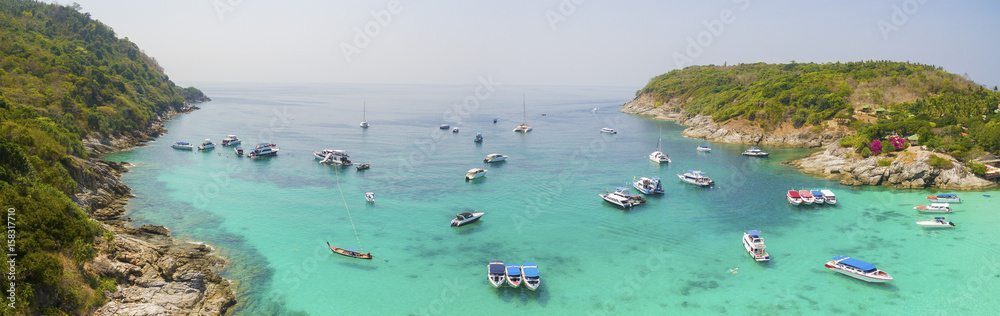 aerial view of tourist speed boat floating over beautiful sea water of racha island phuket southern of thailand most popular traveling destination