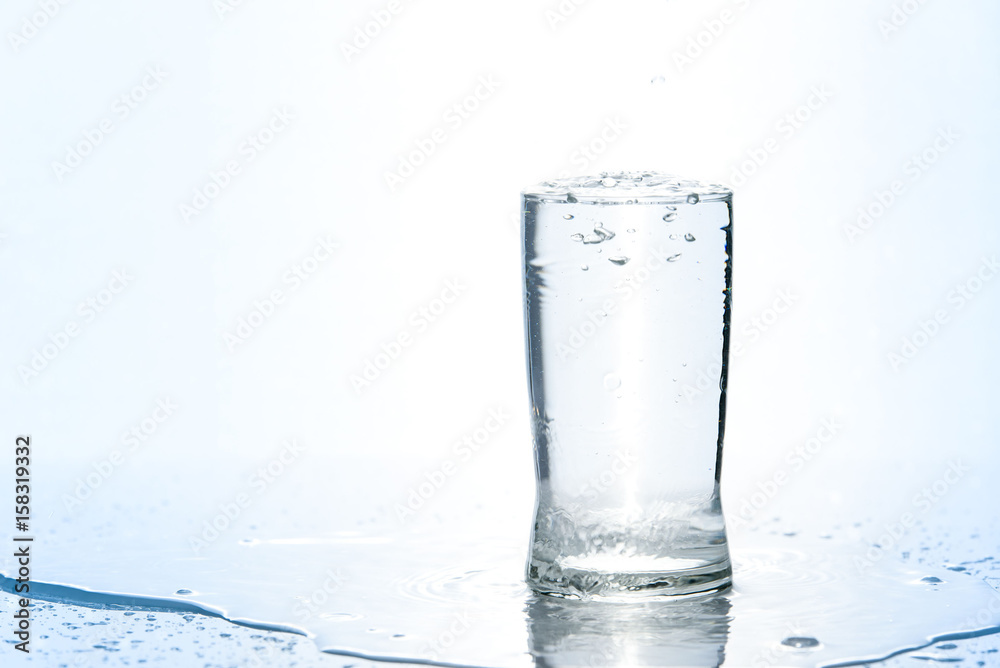 Over pouring water in glass