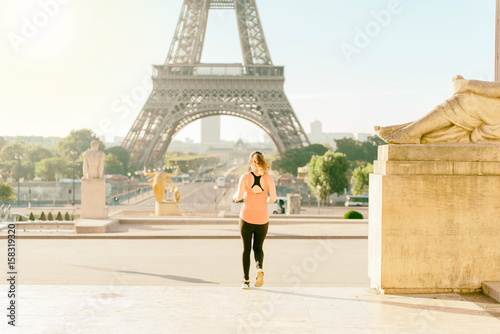 Woman run at tour Eiffel © TinPong