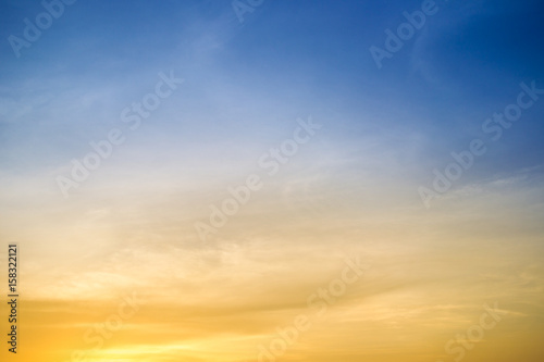 Beautiful sunset sky before the sun is go alway from sky with two tones of sky, cool tone and warm tone. © DG PhotoStock